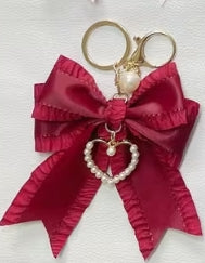 Fabric Bow with Pearl Heart Pendent