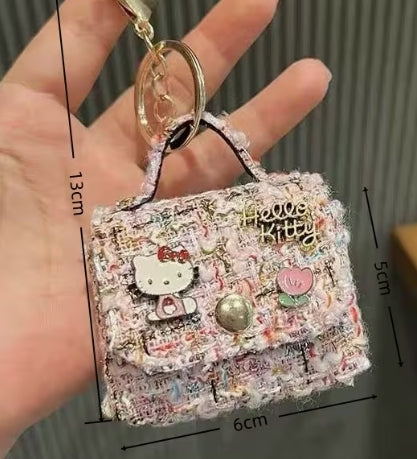 Hello Kitty plush checkered twill mini bag keychain.