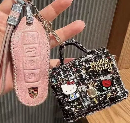 Hello Kitty plush checkered twill mini bag keychain.