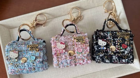 Hello Kitty plush checkered twill mini bag keychain.