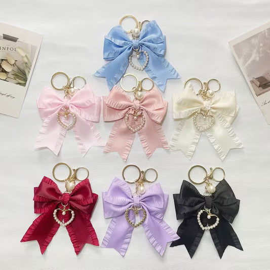 Fabric Bow with Pearl Heart Pendent